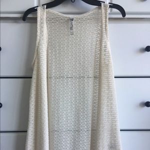 Cream colored sleeveless cardigan